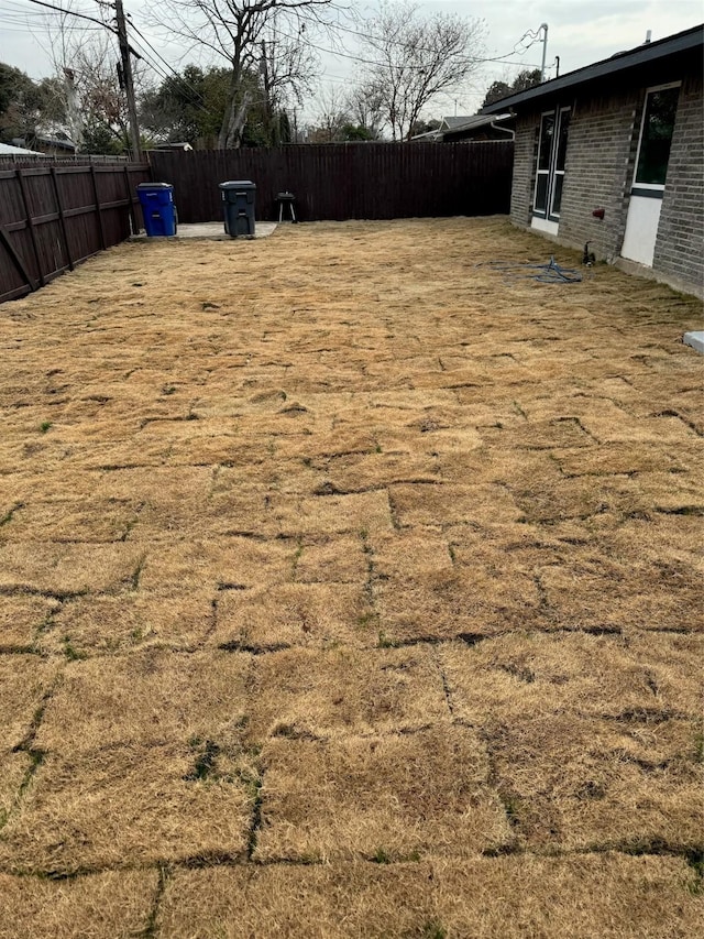 view of yard featuring fence