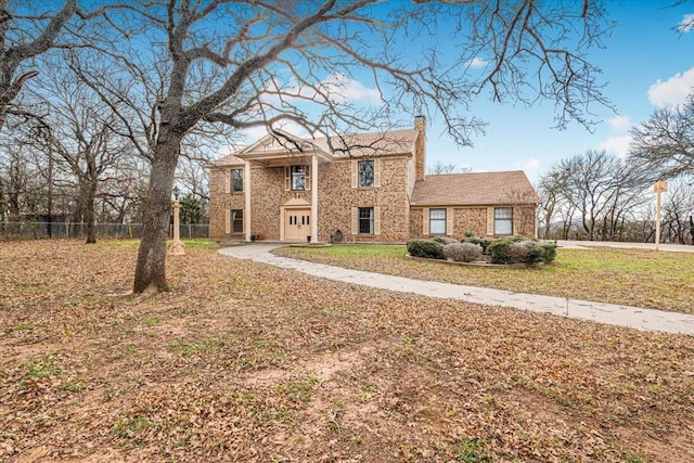 view of front facade with a front lawn