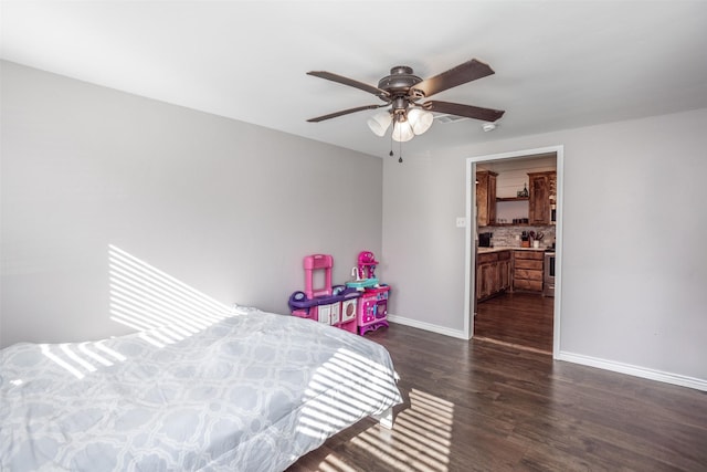 bedroom with dark wood-type flooring and ceiling fan