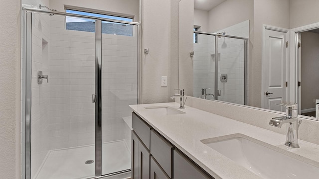 bathroom with vanity and walk in shower