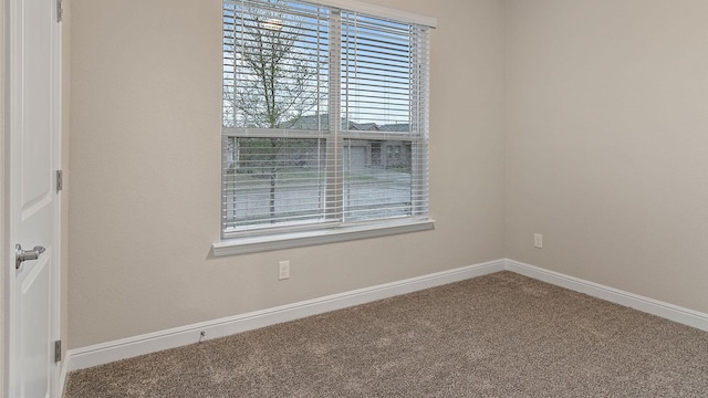 view of carpeted spare room