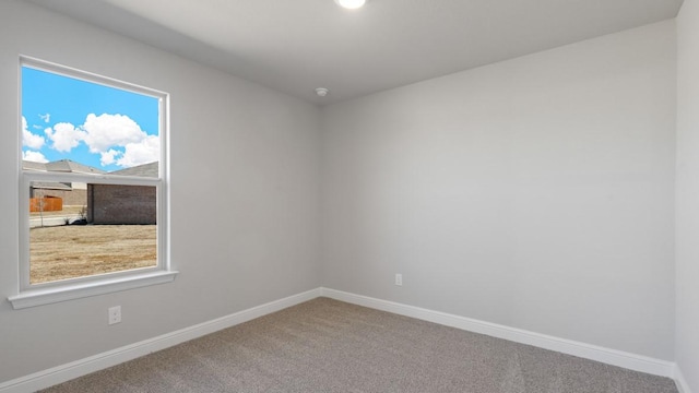 view of carpeted spare room