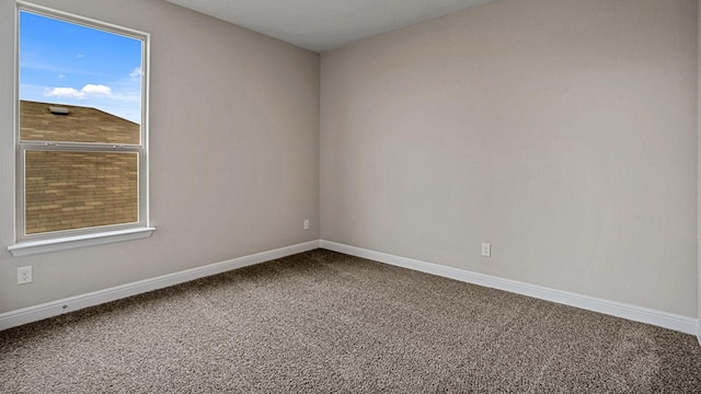 view of carpeted spare room