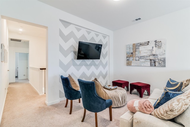 living room with light colored carpet