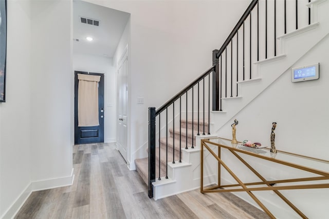 entrance foyer with hardwood / wood-style flooring