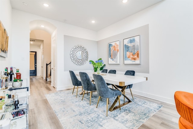 dining room with light hardwood / wood-style floors