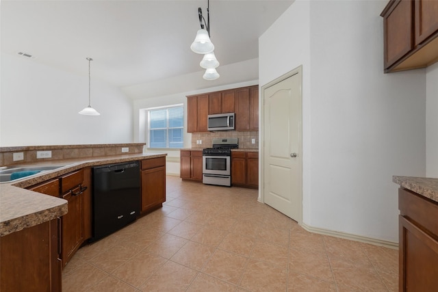 kitchen featuring sink, hanging light fixtures, decorative backsplash, light tile patterned flooring, and stainless steel appliances