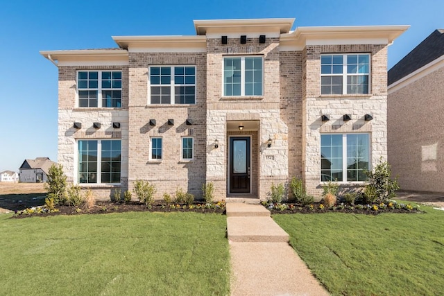 3542 Coneflower Trl, Prairie Ridge, TX 76084 - view of front of house featuring a front yard and stone siding