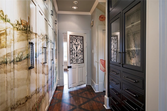 doorway featuring crown molding