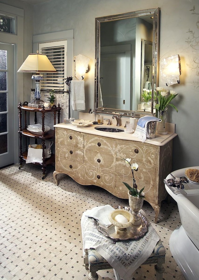 bathroom featuring a bathing tub and vanity