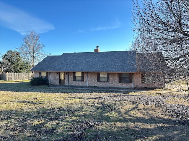 view of front of home with a front lawn