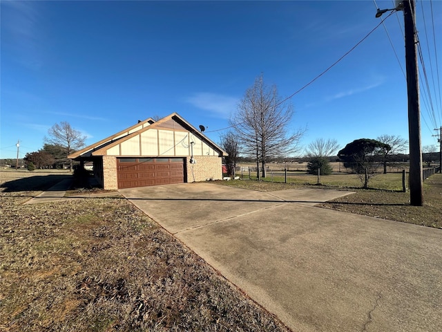 view of property exterior with a garage