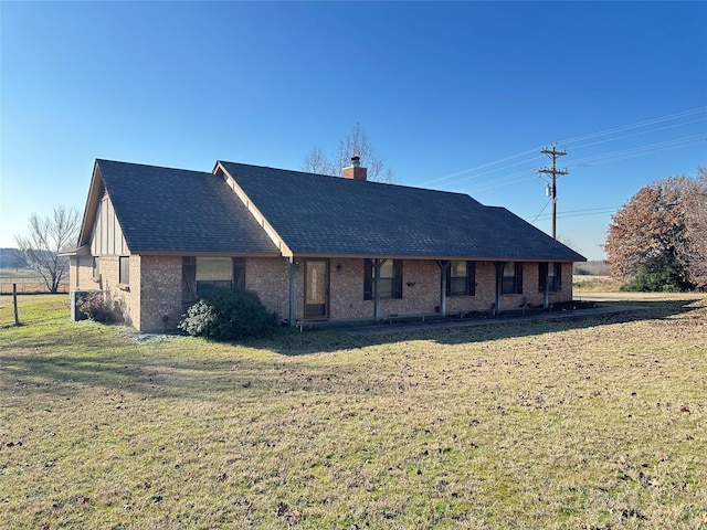 view of front of home with a front yard