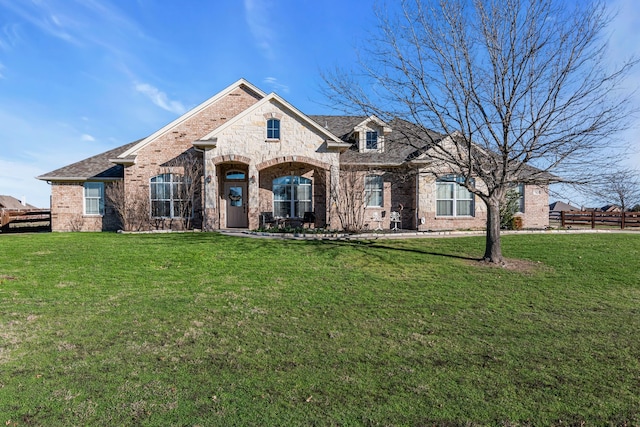 view of front of home with a front lawn