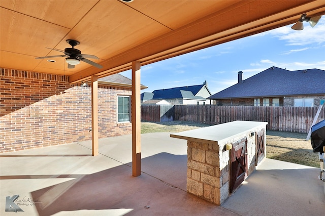 view of patio with ceiling fan