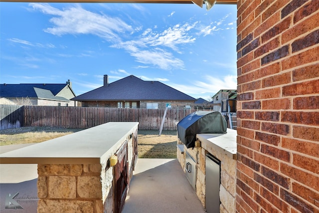 view of patio / terrace with grilling area and exterior kitchen