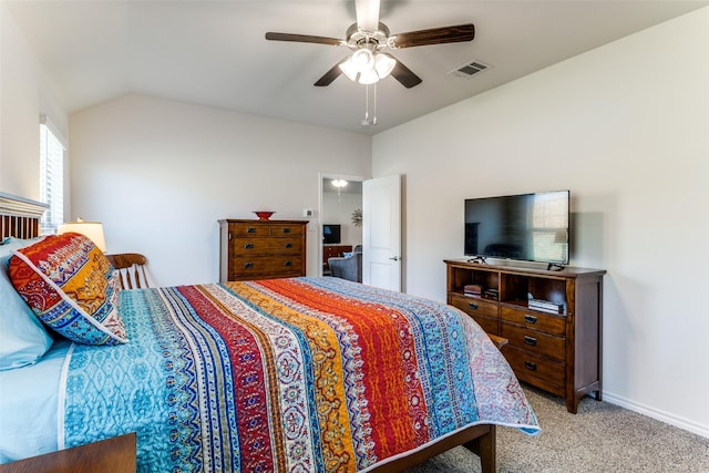 carpeted bedroom featuring ceiling fan and lofted ceiling