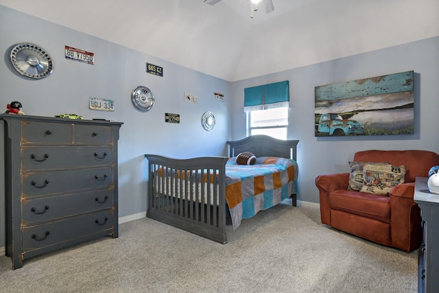 bedroom featuring ceiling fan, light colored carpet, and lofted ceiling