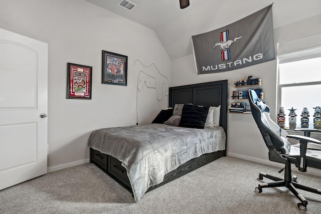 bedroom with lofted ceiling, carpet floors, and ceiling fan