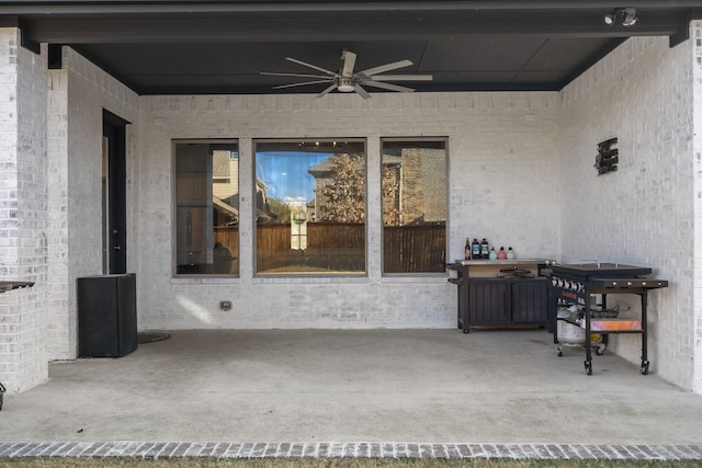 view of patio with ceiling fan