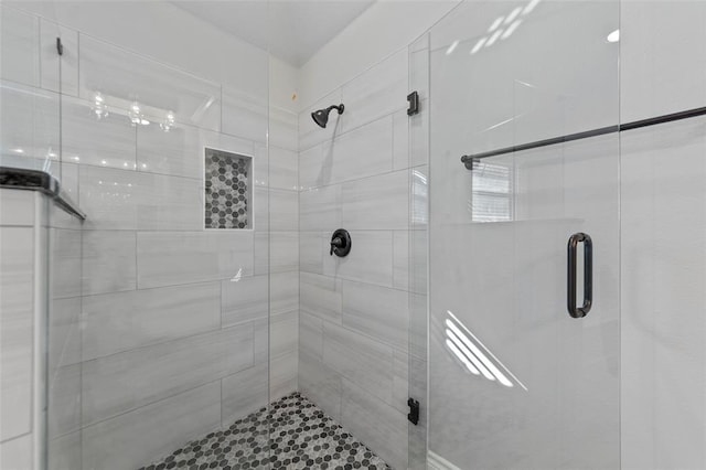 bathroom with an enclosed shower