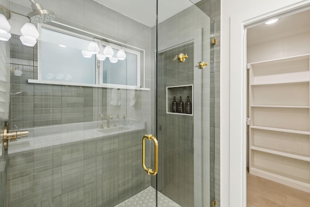 bathroom with an enclosed shower