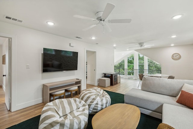 living room with light hardwood / wood-style flooring