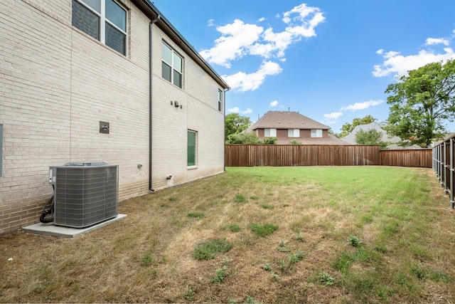 view of yard featuring central AC unit