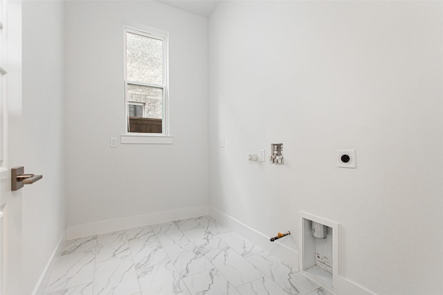 clothes washing area with gas dryer hookup, washer hookup, and hookup for an electric dryer