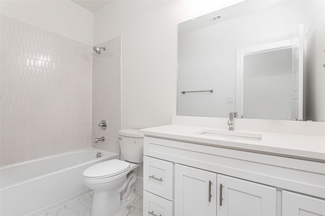 full bathroom featuring vanity, tiled shower / bath combo, and toilet