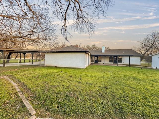 exterior space with a yard