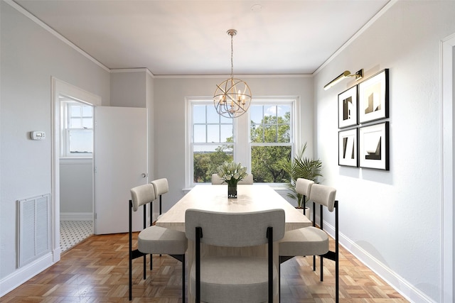 dining room with visible vents, baseboards, an inviting chandelier, and crown molding