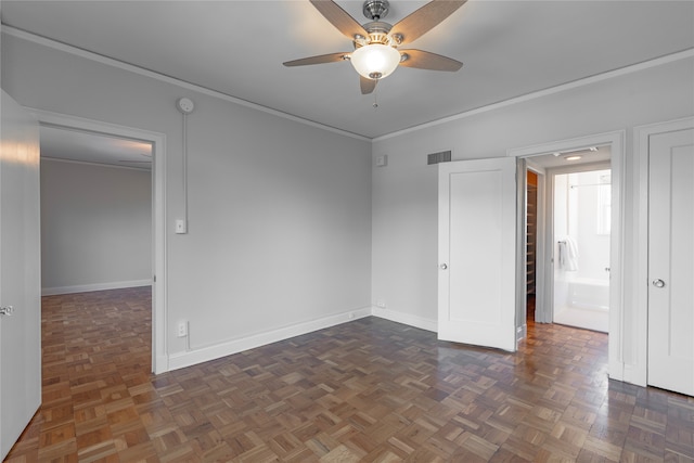 unfurnished bedroom featuring ceiling fan, ornamental molding, and dark parquet flooring