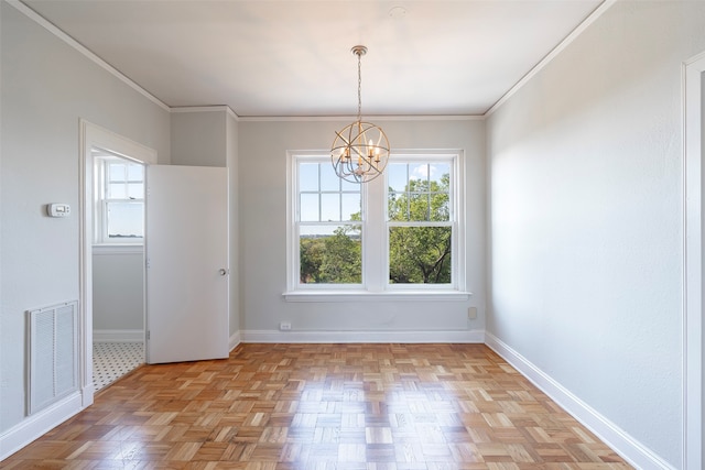 unfurnished dining area featuring visible vents, an inviting chandelier, crown molding, and baseboards