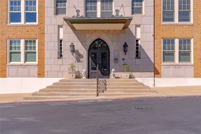 entrance to property featuring french doors