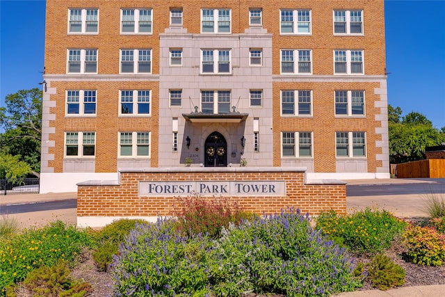 view of building exterior featuring fence