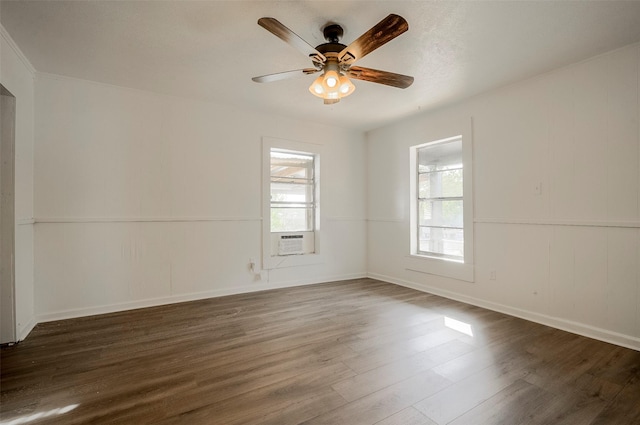 unfurnished room featuring dark hardwood / wood-style floors, ceiling fan, and cooling unit