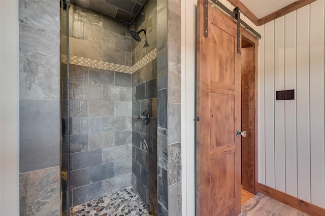 bathroom with tiled shower