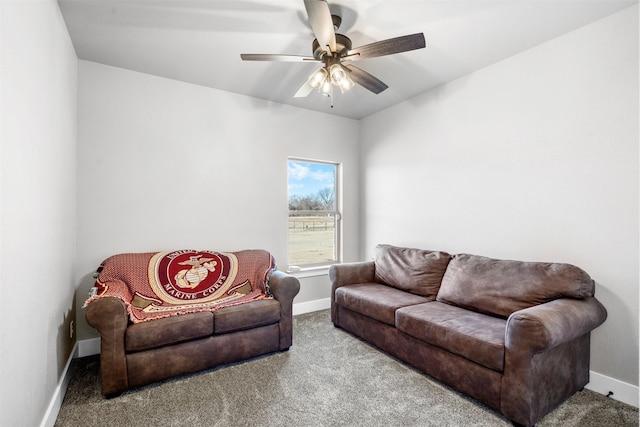 living room featuring carpet and ceiling fan