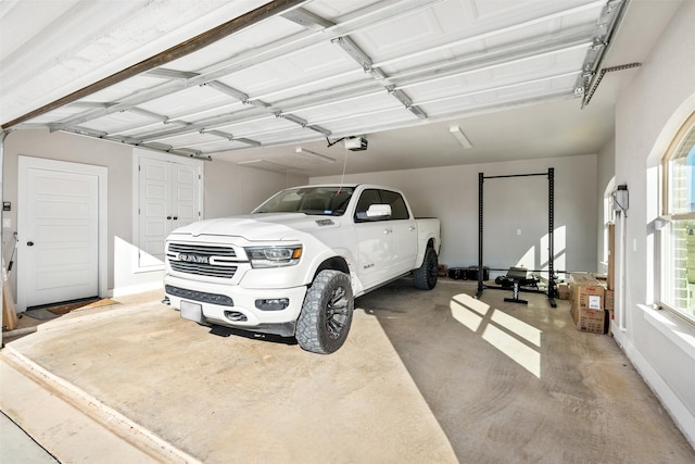 garage featuring a garage door opener