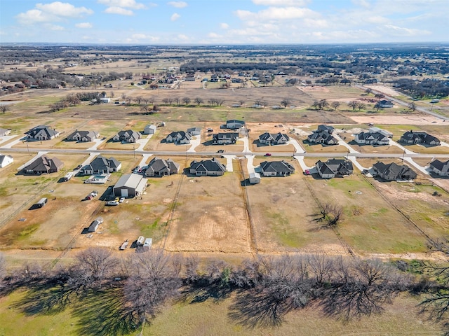 bird's eye view with a rural view