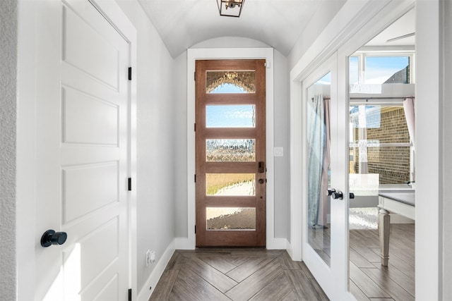 interior space with french doors and lofted ceiling