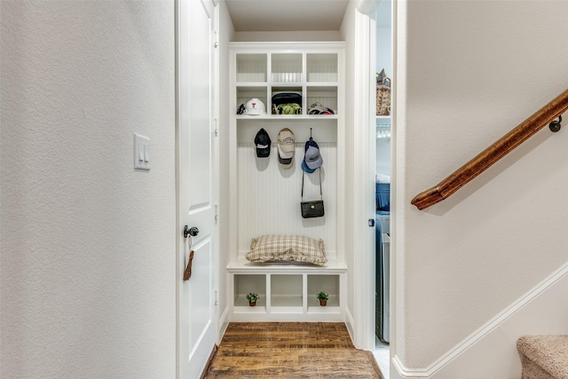 mudroom featuring dark wood-type flooring