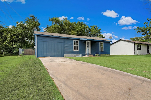 single story home with a front yard