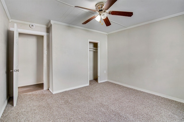 unfurnished bedroom featuring ceiling fan, light colored carpet, and ornamental molding