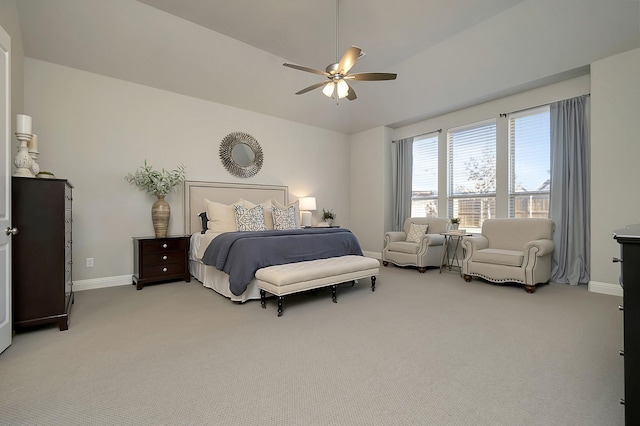 bedroom with light carpet, ceiling fan, and vaulted ceiling