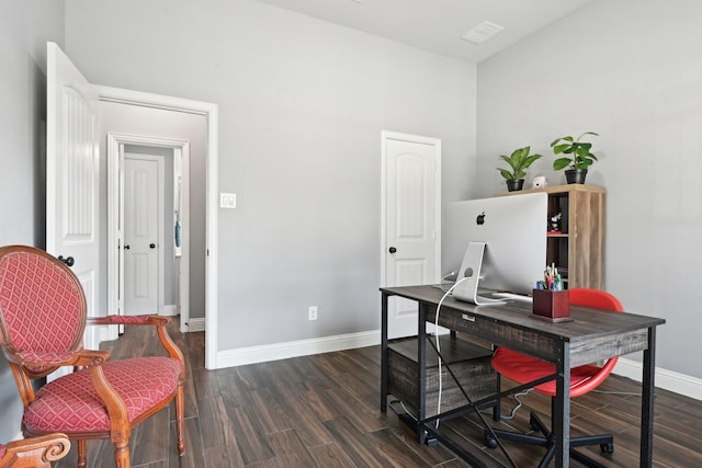 office space featuring baseboards and dark wood-style flooring