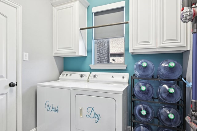 laundry area with cabinet space and washing machine and clothes dryer