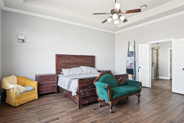 bedroom featuring ceiling fan, dark wood-style flooring, visible vents, a raised ceiling, and crown molding