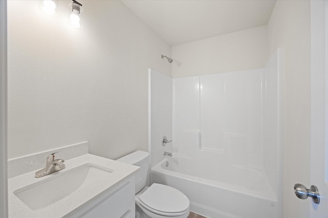 full bathroom with vanity,  shower combination, and toilet